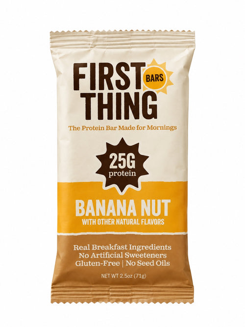A sealed First Thing Banana Nut bar wrapper, front view: 25G protein, Real Breakfast Ingredients, No Artificial Sweeteners, Gluten-Free, No Seed Oils, net weight 2.5 oz (71 g)